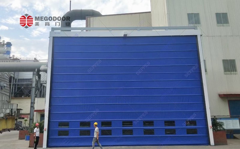 智能抗风保温屏障:镇江工业环境优化的堆积式快速门解决方案插图1 智能抗风保温屏障:镇江工业环境优化的堆积式快速门解决方案插图1